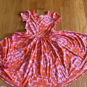 Dot dot smile Coral and Light Pink Aztec Twirl Dress